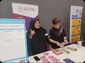 Community booth supporting practical work and learning opportunities.